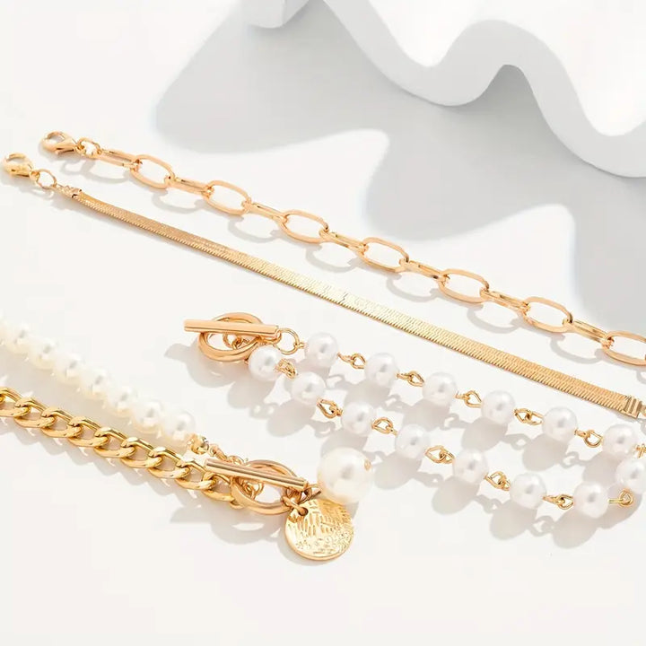 Chic Gold 4-Piece Bracelet Set – Snake, Pearls & Links