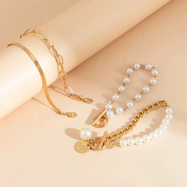Chic Gold 4-Piece Bracelet Set – Snake, Pearls & Links